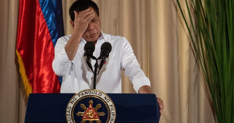 Philippine President Rodrigo Duterte gestures as he gives a speech during the mass oath taking of officials of various national leagues at the Malacanang Palace in Manila on June 1, 2017. Philippine airstrikes aimed at Islamist militants who are holding hostages as human shields in a southern city killed 11 soldiers, authorities said on June 1, as they conceded hundreds of gunmen may have escaped a blockade. / AFP PHOTO / NOEL CELIS (Photo credit should read NOEL CELIS/AFP/Getty Images)