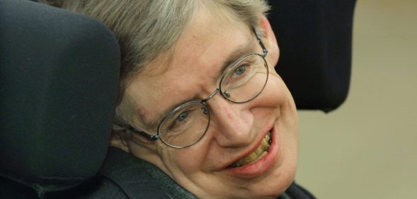 399485 04: Physicist Stephen Hawking smiles at a symposium to honor his birthday at the Center for Mathematical Sciences at the University of Cambridge January 11, 2002 in Cambridge, England. Hawking turned 60-years-old on January 8, 2002 and is the Lucasian Professor of Mathematics, a post once held by Sir Isaac Newton. (Photo by Sion Touhig/Getty Images)