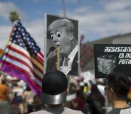 eople march in the #ResistMarch during the 47th annual LA Pride