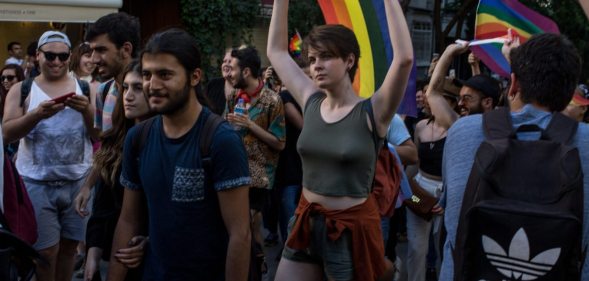 ISTANBUL, TURKEY - JUNE 25: LGBT supporters march towards Taksim Square on June 25, 2017 in Istanbul, Turkey. The 2017 LGBT Pride March was banned by authorities for the third year. Organisers defied the order and people attempted to march to Taksim Square but were met by a heavy police presence and the crowd was dispersed by tear gas and several people were arrested.