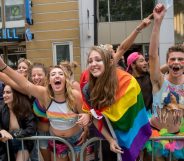 Ciara Hall (L) cheers with friends during the San Francisco Pride parade in San Francisco, California on Sunday, June, 25, 2017. / AFP PHOTO / Josh Edelson (Photo credit should read JOSH EDELSON/AFP/Getty Images)