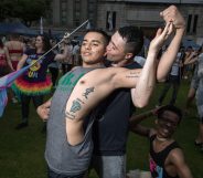 Participants pose for a photo during a 'Gay Pride' gathering in Seoul on July 15, 2017. Thousands of people celebrated gay rights with song, dance and a march in Seoul on July 15, amid rain and boisterous protests by conservative Christians. Religious South Koreans have been a loud fixture at the annual parade for years, holding a rival anti-homosexuality rally while trying to physically block the march. / AFP PHOTO / Ed JONES (Photo credit should read ED JONES/AFP/Getty Images)