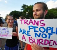 Protesters gather in front of the White House on July 26, 2017, in Washington, DC. Trump announced on July 26 that transgender people may not serve "in any capacity" in the US military, citing the "tremendous medical costs and disruption" their presence would cause. / AFP PHOTO / PAUL J. RICHARDS (Photo credit should read PAUL J. RICHARDS/AFP/Getty Images)