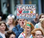 GLASGOW, SCOTLAND - AUGUST 19: A participant holds a sign saying "Trans and Proud" during the Glasgow Pride march on August 19, 2017 in Glasgow, Scotland. The largest festival of LGBTI celebration in Scotland has been held every year in Glasgow since 1996. (Photo by Robert Perry/Getty Images)