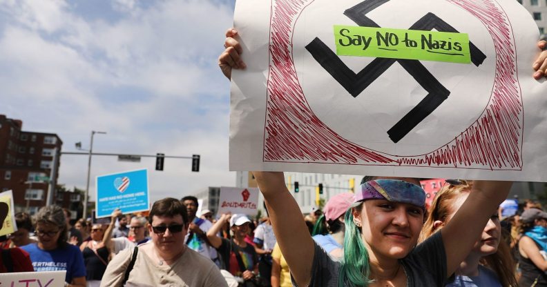 BOSTON, MA - AUGUST 19: Thousands of protesters march in Boston against a planned 'Free Speech Rally' just one week after the violent 'Unite the Right' rally in Virginia left one woman dead and dozens more injured on August 19, 2017 in Boston, United States. Although the rally organizers stress that they are not associated with any alt-right or white supremacist groups, the city of Boston and Police Commissioner William Evans are preparing for possible confrontations at the afternoon rally. (Photo by Spencer Platt/Getty Images)