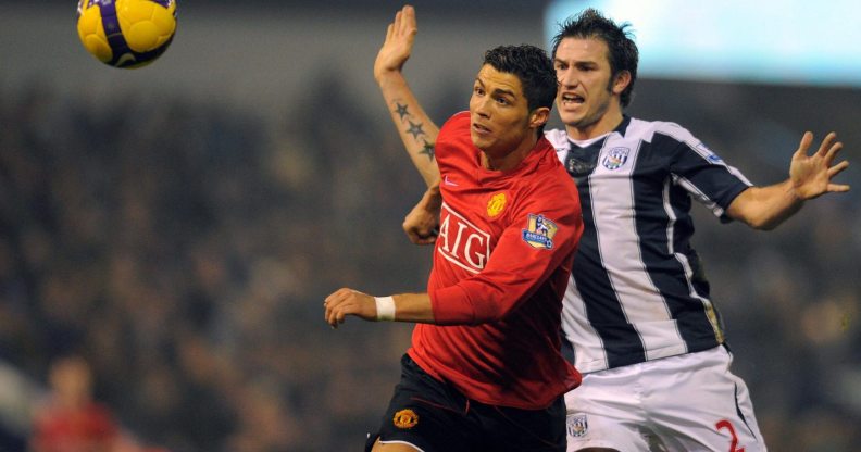 Manchester United's Portuguese midfielder Cristiano Ronaldo (L) vies with West Bromwich Albion's Belgium defender Carl Hoefkens during the English Premier league football match at The Hawthorns, West Bromwich, central England, on January 27, 2009. AFP PHOTO/ANDREW YATES FOR EDITORIAL USE ONLY Additional licence required for any commercial/promotional use or use on TV or internet (except identical online version of newspaper) of Premier League/Football League photos. Tel DataCo +44 207 2981656. Do not alter/modify photo. (Photo credit should read ANDREW YATES/AFP/Getty Images)