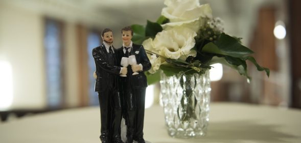 BERLIN, GERMANY - OCTOBER 01: Same sex wedding figures stand on a table after the first wedding after new law 'Ehe fuer alle' (wedding for everyone) in Germany at Schoeneberg district townhall on October 1, 2017 in Berlin, Germany.(Photo by Steffi Loos/Getty Images)