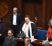 Uruguayan senator Michelle Suarez (C) arrives at the senate for her swear in ceremony in Montevideo, on October 10, 2017. Michelle Suarez is the first transgender lawmaker to have a seat in the Uruguayan parliament. / AFP PHOTO / MIGUEL ROJO (Photo credit should read MIGUEL ROJO/AFP/Getty Images)