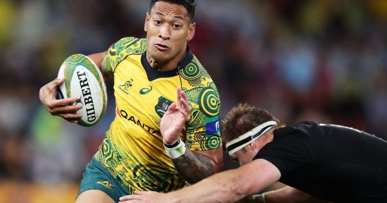 BRISBANE, AUSTRALIA - OCTOBER 21: Israel Folau of the Wallabies is tackled during the Bledisloe Cup match between the Australian Wallabies and the New Zealand All Blacks at Suncorp Stadium on October 21, 2017 in Brisbane, Australia. (Photo by Matt King/Getty Images)