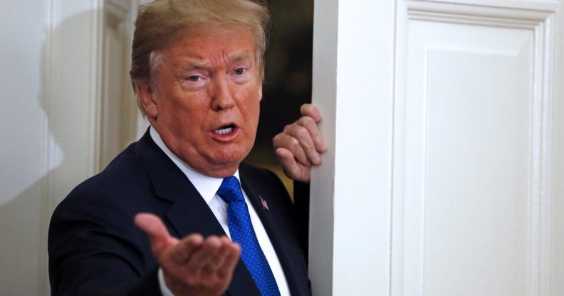 WASHINGTON, DC - NOVEMBER 02: (AFP OUT) U.S. President Donald Trump gestures to reporters after joining Broadcom CEO Hock Tan in announcing the repatriation of Tan's company headquarters to the United States from Singapore during a ceremony in the Oval Office of the White House, in Washington, DC, 11-2-17. At left is Rep. Kevin McCarthy (R-CA). (Photo by Martin H. Simon - Pool/Getty Images)