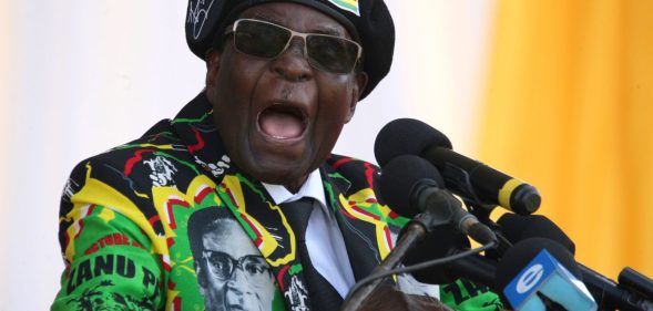 Zimbabwe's President Robert Mugabe delivers a speech during the Zimbabwe ruling party Zimbabwe African National Union- Patriotic Front (Zanu PF) youth interface Rally on November 4, 2017 in Bulawayo. / AFP PHOTO / ZINYANGE AUNTONY (Photo credit should read ZINYANGE AUNTONY/AFP/Getty Images)