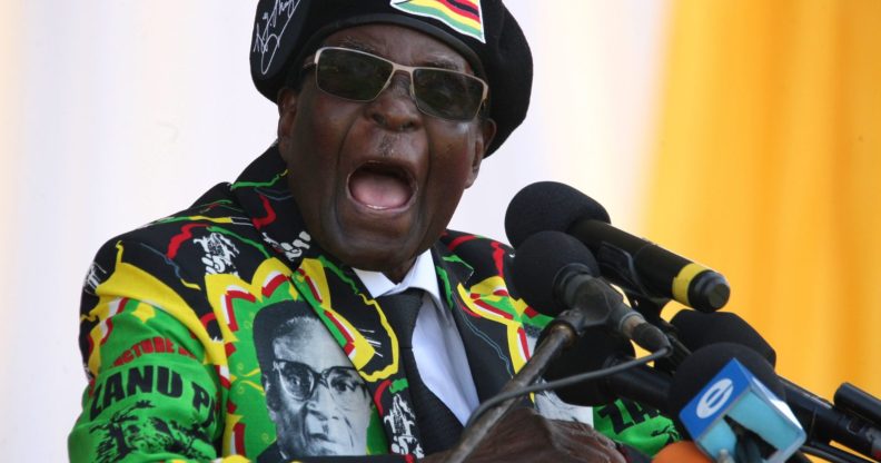 Zimbabwe's President Robert Mugabe delivers a speech during the Zimbabwe ruling party Zimbabwe African National Union- Patriotic Front (Zanu PF) youth interface Rally on November 4, 2017 in Bulawayo. / AFP PHOTO / ZINYANGE AUNTONY (Photo credit should read ZINYANGE AUNTONY/AFP/Getty Images)