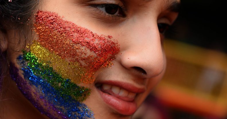 An Indian supporter of the lesbian, gay, bisexual, transgender (LGBT) community takes part in a pride parade in New Delhi on November 12, 2017. Hundreds of members of the LGBT community marched through the Indian capital for the 10th annual Delhi Queer Pride Parade. / AFP PHOTO / SAJJAD HUSSAIN (Photo credit should read SAJJAD HUSSAIN/AFP/Getty Images)