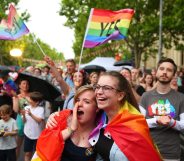 MELBOURNE, AUSTRALIA - NOVEMBER 15: Supporters of the 'Yes' vote for marriage equality celebrate at Melbourne's Result Street Party on November 15, 2017 in Melbourne, Australia. Australians have voted for marriage laws to be changed to allow same-sex marriage, with the Yes vote claiming 61.6% to to 38.4% for No vote. Despite the Yes victory, the outcome of Australian Marriage Law Postal Survey is not binding, and the process to change current laws will move to the Australian Parliament in Canberra. (Photo by Scott Barbour/Getty Images)