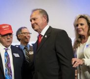 BIRMINGHAM, AL - NOVEMBER 16: Republican candidate for U.S. Senate Judge Roy Moore and his wife Kayla Moore exit a news conference with supporters and faith leaders, November 16, 2017 in Birmingham, Alabama. Moore refused to answer questions regarding sexual harassment allegations and pursuing relationships with underage women. (Drew Angerer/Getty Images)