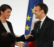 French President Emmanuel Macron (R) smiles to French Junior Minister for Gender Equality Marlene Schiappa after he delivered a speech during the International Day for the Elimination of Violence Against Women, on November 25, 2017 at the Elysee Palace in Paris. / AFP PHOTO / POOL / LUDOVIC MARIN (Photo credit should read LUDOVIC MARIN/AFP/Getty Images)