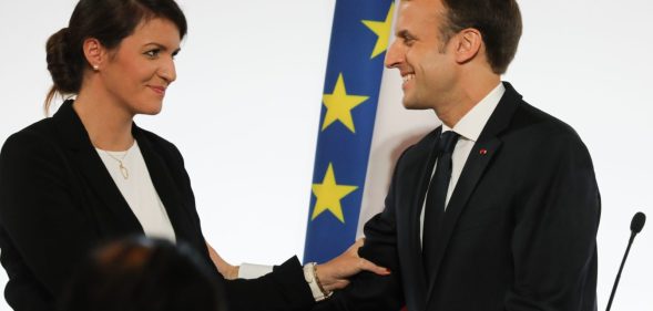 French President Emmanuel Macron (R) smiles to French Junior Minister for Gender Equality Marlene Schiappa after he delivered a speech during the International Day for the Elimination of Violence Against Women, on November 25, 2017 at the Elysee Palace in Paris. / AFP PHOTO / POOL / LUDOVIC MARIN (Photo credit should read LUDOVIC MARIN/AFP/Getty Images)