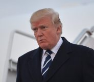 US President Donald Trump steps off Air Force One upon arrival at Andrews Air Force Base in Maryland on December 2, 2017. Trump is returning to Washington, DC after attending fundraisers in New York, New York. / AFP PHOTO / MANDEL NGAN (Photo credit should read MANDEL NGAN/AFP/Getty Images)