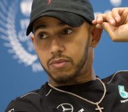 World's Formula One British driver Lewis Hamilton attends a press conference of the FIA (International Automobile Federation) on December 8, 2017 in Paris. / AFP PHOTO / CHRISTOPHE SIMON (Photo credit should read CHRISTOPHE SIMON/AFP/Getty Images)