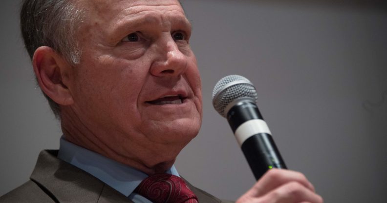 Republican Senatorial candidate Roy Moore addresses his supporters in Montgomery, Alabama, on December 12, 2017. Democrat Doug Jones scored a victory Tuesday in a fiercely contested US Senate race in conservative Alabama, dealing a setback to US President Donald Trump, whose candidate could not overcome damaging sexual misconduct accusations. With 92 percent of precincts reporting, former prosecutor Jones secured 49.5 percent of the vote compared to Roy Moore's 48.8 percent, CNN and other networks reported. / AFP PHOTO / JIM WATSON (Photo credit should read JIM WATSON/AFP/Getty Images)