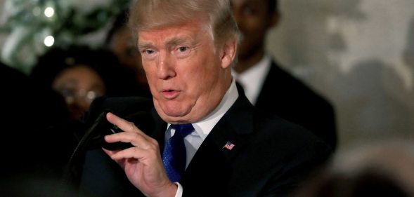 WASHINGTON, DC - DECEMBER 13: U.S. President Donald Trump speaks about tax reform in the Cross Hall at the White House on December 13, 2017 in Washington, DC. House and Senate Republicans are working on a tentative deal on tax reform that will overhaul the U.S. tax system. (Photo by Mark Wilson/Getty Images)