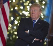 WASHINGTON, DC - DECEMBER 13: U.S. President Donald Trump listens to a group of families, Young Republicans and College Republicans at the White House, while speaking about how planned tax reforms would benefit middle class families . (Photo by Chris Kleponis-Pool/Getty Images)