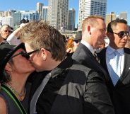 Lesbian and gay couples embrace outside the ruling Labor Party's conference during a mass 'illegal wedding' in Sydney on August 1, 2009. The national Labor conference voted to develop a system for the registration and recognition of same-sex relationships, after gay rights advocates failed to gather enough numbers for a resolution to legalise gay marriage. Australian Prime Minister Kevin Rudd won the 2007 election on a platform that supported the former conservative government's legal definition of marriage as a union between a man and a woman. AFP PHOTO/Torsten BLACKWOOD (Photo credit should read TORSTEN BLACKWOOD/AFP/Getty Images)