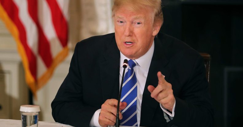 WASHINGTON, DC - FEBRUARY 12: U.S. President Donald Trump speaks during a meeting with state and local officials to unveil his administration's long-awaited infrastructure plan in the State Dining Room at the White House February 12, 2018 in Washington, DC. The $1.5 trillion plan to repair and rebuild the nation's crumbling highways, bridges, railroads, airports, seaports and water systems is funded with $200 million in federal money with the remaining 80 percent coming from state and local governments. (Photo by Chip Somodevilla/Getty Images)