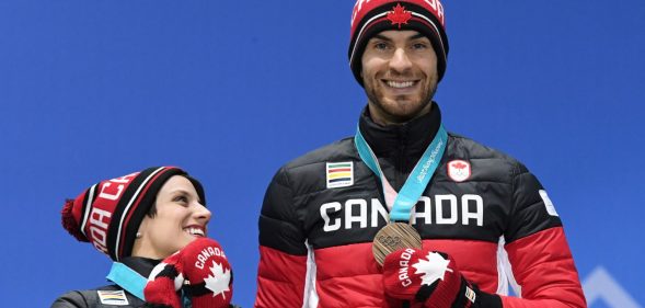 Canada's bronze medallists Meagan Duhamel (L) and Eric Radford pose on the podium during the medal ceremony for the figure skating pair event at the Pyeongchang Medals Plaza during the Pyeongchang 2018 Winter Olympic Games in Pyeongchang on February 15, 2018. / AFP PHOTO / Dimitar DILKOFF (Photo credit should read DIMITAR DILKOFF/AFP/Getty Images)