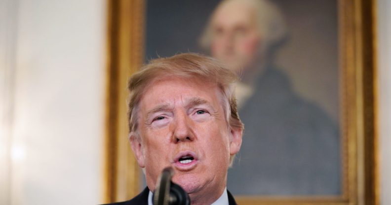 US President Donald Trump speaks on the Florida school shooting, in the Diplomatic Reception Room of the White House on February 15, 2018 in Washington, DC. Earlier Thursday, President Trump issued a largely symbolic proclamation, ordering that flags be flown at half staff at US embassies, government buildings and military installations."Our nation grieves with those who have lost loved ones in the shooting at the Marjory Stoneman Douglas High School in Parkland, Florida," he said. / AFP PHOTO / MANDEL NGAN (Photo credit should read MANDEL NGAN/AFP/Getty Images)