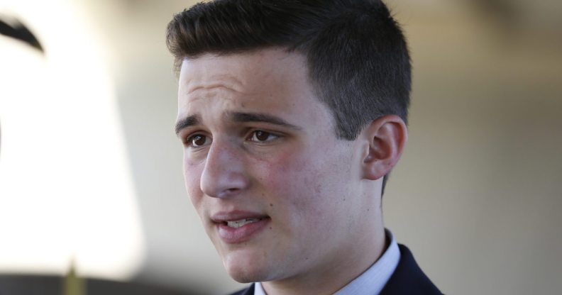 Marjory Stoneman Douglas High School student Cameron Kasky speaks with the media in Parkland, Florida on February 16, 2018, two days after former student Nikolas Cruz opened fire at the school leaving 17 people dead and 15 injured. Stoneman Douglas students have taken to social media to blast defenders of the nation's loose gun laws. In an eloquent essay published online, 17-year-old Cameron Kasky blasted both Republican and Democratic politicians for not doing anything. "We can't ignore the issues of gun control that this tragedy raises," he wrote. "And so, I'm asking -- no, demanding -- we take action now. Why? Because at the end of the day, the students at my school felt one shared experience -- our politicians abandoned us by failing to keep guns out of schools." / AFP PHOTO / RHONA WISE (Photo credit should read RHONA WISE/AFP/Getty Images)