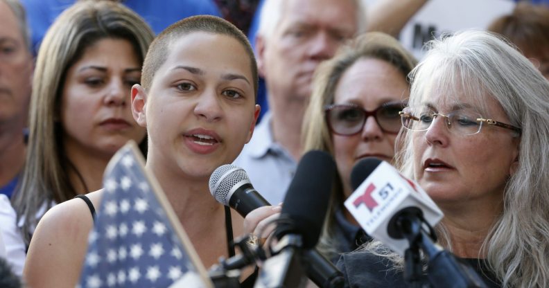 Marjory Stoneman Douglas High School student Emma Gonzalez is hugged by a friend following her speech at a rally for gun control at the Broward County Federal Courthouse in Fort Lauderdale, Florida on February 17, 2018. A former student, Nikolas Cruz, opened fire at the high school leaving 17 people dead and 15 injured on February 14. / AFP PHOTO / RHONA WISE (Photo credit should read RHONA WISE/AFP/Getty Images)