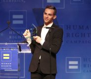 LOS ANGELES, CA - MARCH 10: Adam Rippon celebrates as he is honored with the Visibilty Award during the Human Rights Campaign 2018 Los Angeles Dinner at JW Marriott Los Angeles at L.A. LIVE on March 10, 2018 in Los Angeles, California. (Photo by Frederick M. Brown/Getty Images)