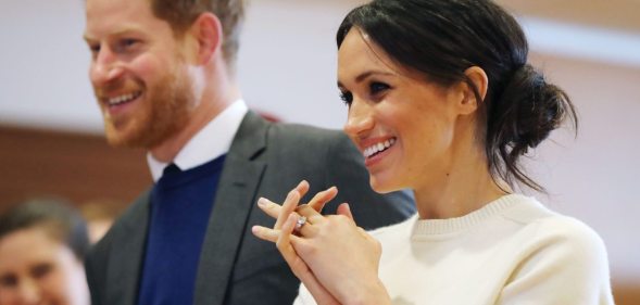 BELFAST, NORTHERN IRELAND - MARCH 23: Prince Harry and Meghan Markle during a visit to Catalyst Inc science park in Belfast where they met some of Northern Ireland's brightest young entrepreneurs on March 23, 2018 in Belfast, Nothern Ireland. (Photo by Niall Carson - Pool/Getty Images)