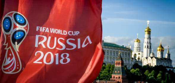 A photograph taken on May 30, 2018 shows the FIFA World Cup 2018 flag in front of the Kremlin in Moscow. - The FIFA World Cup 2018 tournament kicks off on June 14, 2018. (Photo by Mladen ANTONOV / AFP) (Photo credit should read MLADEN ANTONOV/AFP/Getty Images)