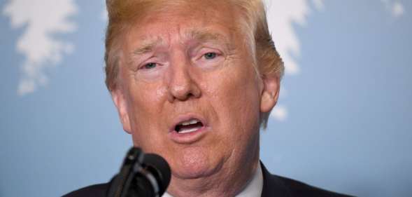 US President Donald Trump speaks to reporters on June 9, 2018, during the G7 Summit in La Malbaie, Quebec, Canada. (Photo by SAUL LOEB / AFP) (Photo credit should read SAUL LOEB/AFP/Getty Images)