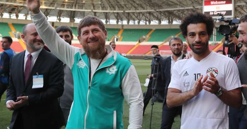 Egyptian national team football player and Liverpool's star striker Mohamed Salah (R) and head of the Chechen Republic Ramzan Kadyrov pose during a training of Egyptian team at the Akhmat Arena stadium in Grozny on June 10, 2018, ahead of the Russia 2018 World Cup. - Egypt's national football team will use the venue as their base camp training site. (Photo by KARIM JAAFAR / AFP) (Photo credit should read KARIM JAAFAR/AFP/Getty Images)