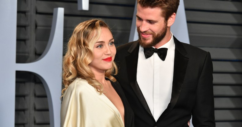 Miley Cyrus (left) and Liam Hemsworth