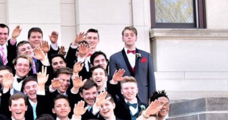 Jordan Blue stands defiant as many of his classmates do a 'mass Nazi salute'