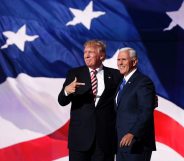 CLEVELAND, OH - JULY 20: Republican presidential candidate Donald Trump stand with Republican vice presidential candidate Mike Pence and acknowledge the crowd on the third day of the Republican National Convention on July 20, 2016 at the Quicken Loans Arena in Cleveland, Ohio. Republican presidential candidate Donald Trump received the number of votes needed to secure the party's nomination. An estimated 50,000 people are expected in Cleveland, including hundreds of protesters and members of the media. The four-day Republican National Convention kicked off on July 18. (Photo by Chip Somodevilla/Getty Images)