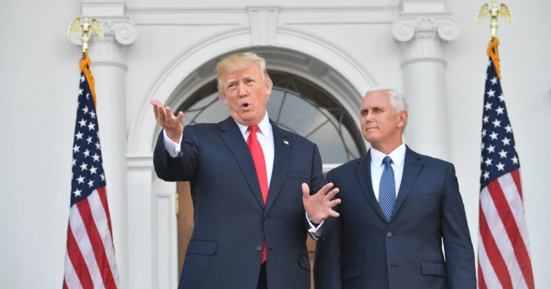 US President Donald Trump and Vice President Mike Pence speak to the press on August 10, 2017, at Trump's Bedminster National Golf Club in New Jersey before a security briefing. / AFP PHOTO / Nicholas Kamm (Photo credit should read NICHOLAS KAMM/AFP/Getty Images)