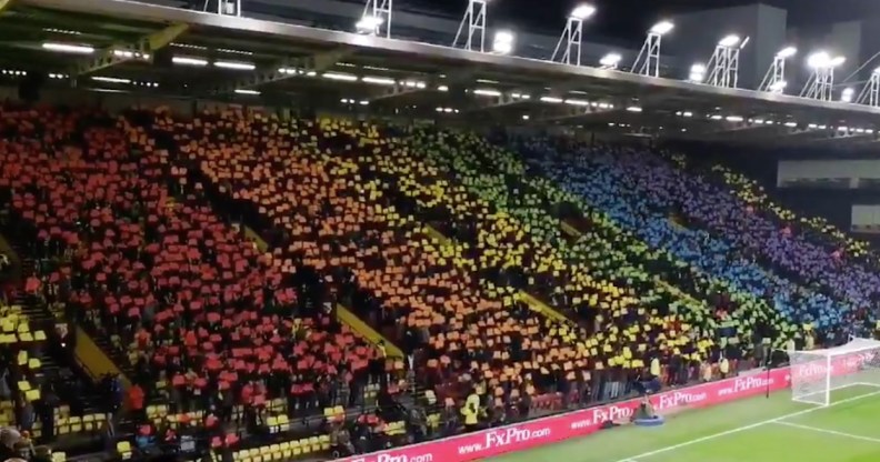 Watford FC fans make a huge Pride flag in the stands