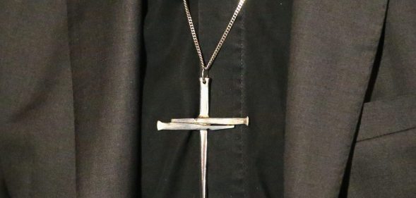 MELBOURNE, AUSTRALIA - AUGUST 13: A detail of the cross necklace worn by The Archbishop of Canterbury, Justin Welby as he speaks during a press conference ahead of Archbishop Philip Freier's inauguration as Primate of Austalia at The Cathedral Chapter House on August 13, 2014 in Melbourne, Australia. It is the first visit to Australia by the spiritual head of the worldwide Anglican Communion since 1997. (Photo by Scott Barbour/Getty Images)