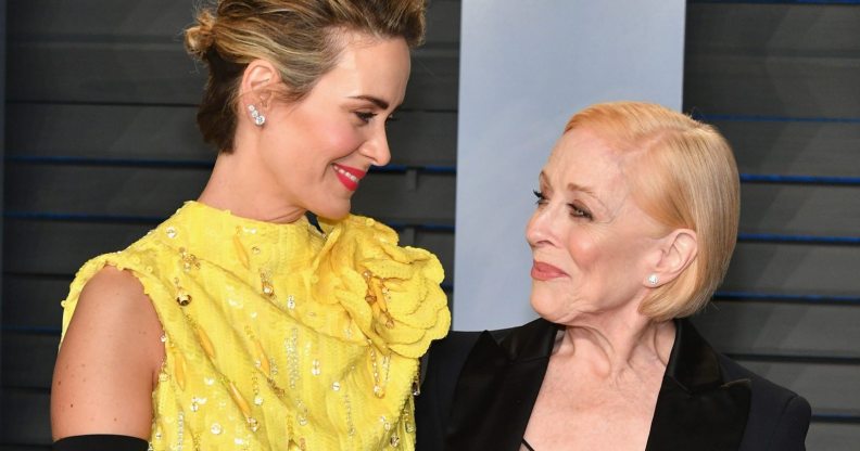 Sarah Paulson (L) and wife Holland Taylor attend the 2018 Vanity Fair Oscar Party.