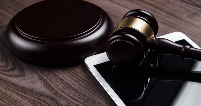 judge gavel and tablet computer on the table