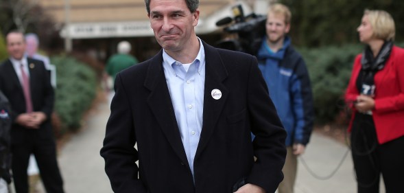 Ken Cuccinelli with his hands in his pockets