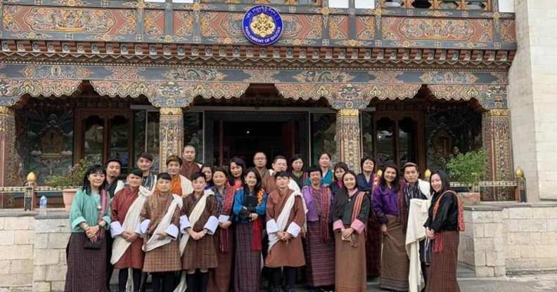 Members of Bhutan's LGBT community outside of the National Assembly building.