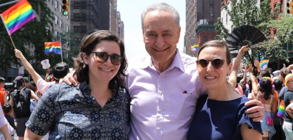 Alison Schumer poses with her father Senator Chuck Schumer and her fiancée Elizabeth Weiland at the NYC Pride Parade.