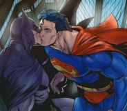 Superman and Batman kissing