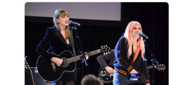 A tweet celebrating Taylor Swift and Hayley Kiyoko performing together.